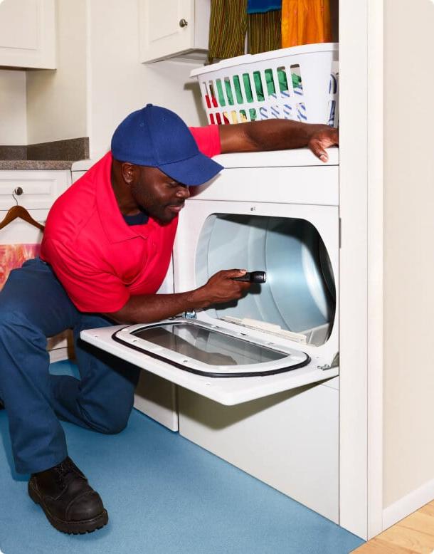 Man fixing washing machine